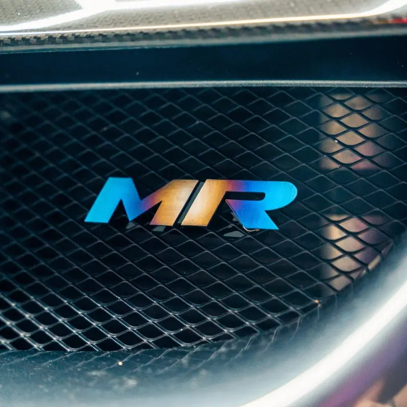 Jdc Titanium "Mr" Front Grill Badge | Mitsubishi Evo 8/9 10