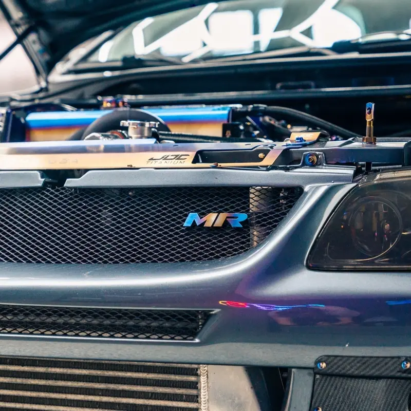 Jdc Titanium "Mr" Front Grill Badge | Mitsubishi Evo 8/9 2