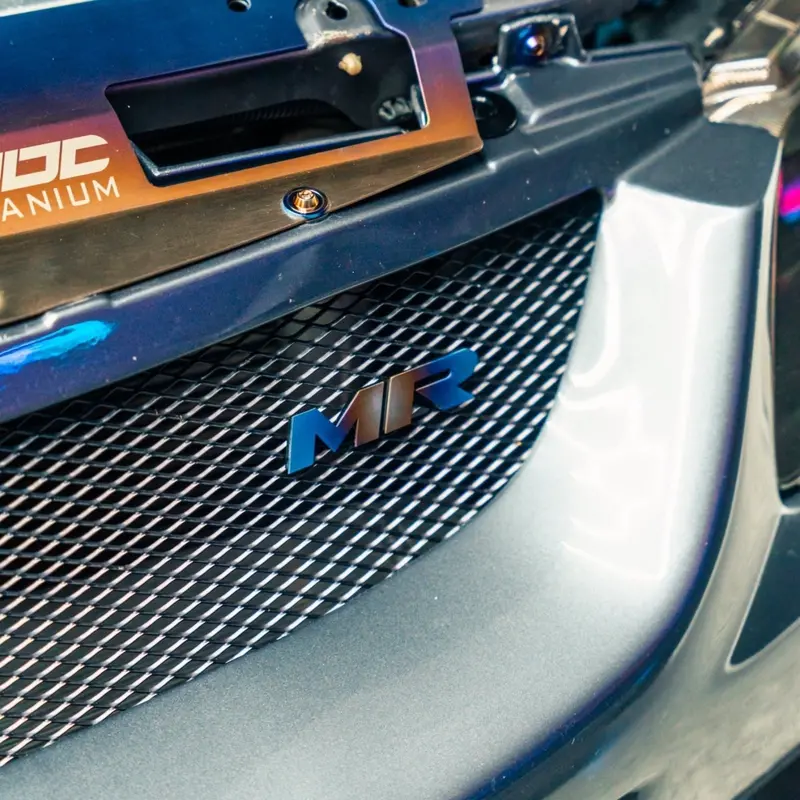 Jdc Titanium "Mr" Front Grill Badge | Mitsubishi Evo 8/9 5